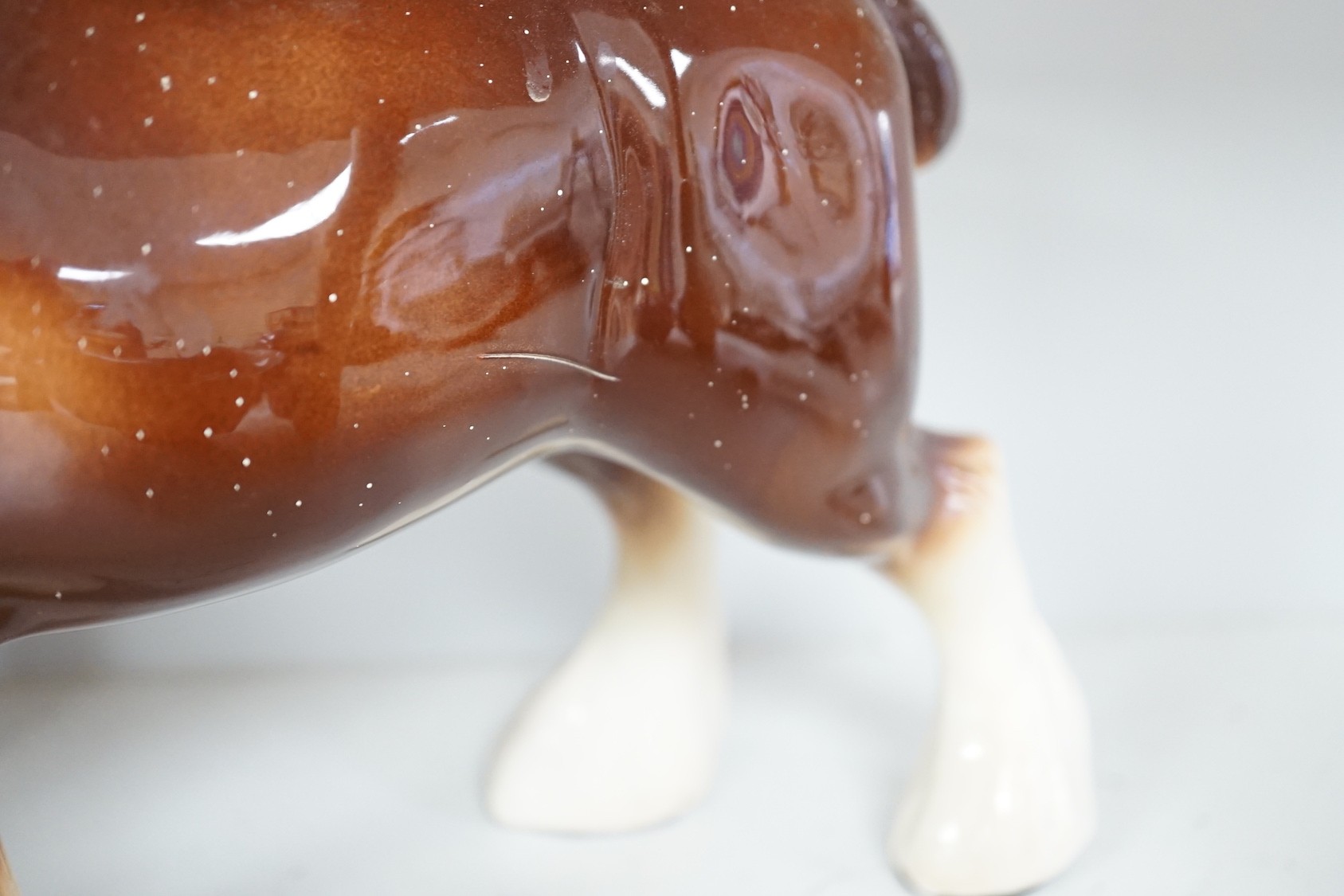 A group of four various Beswick Shire horses and two models of champion bulls, largest shire 27 cms high.